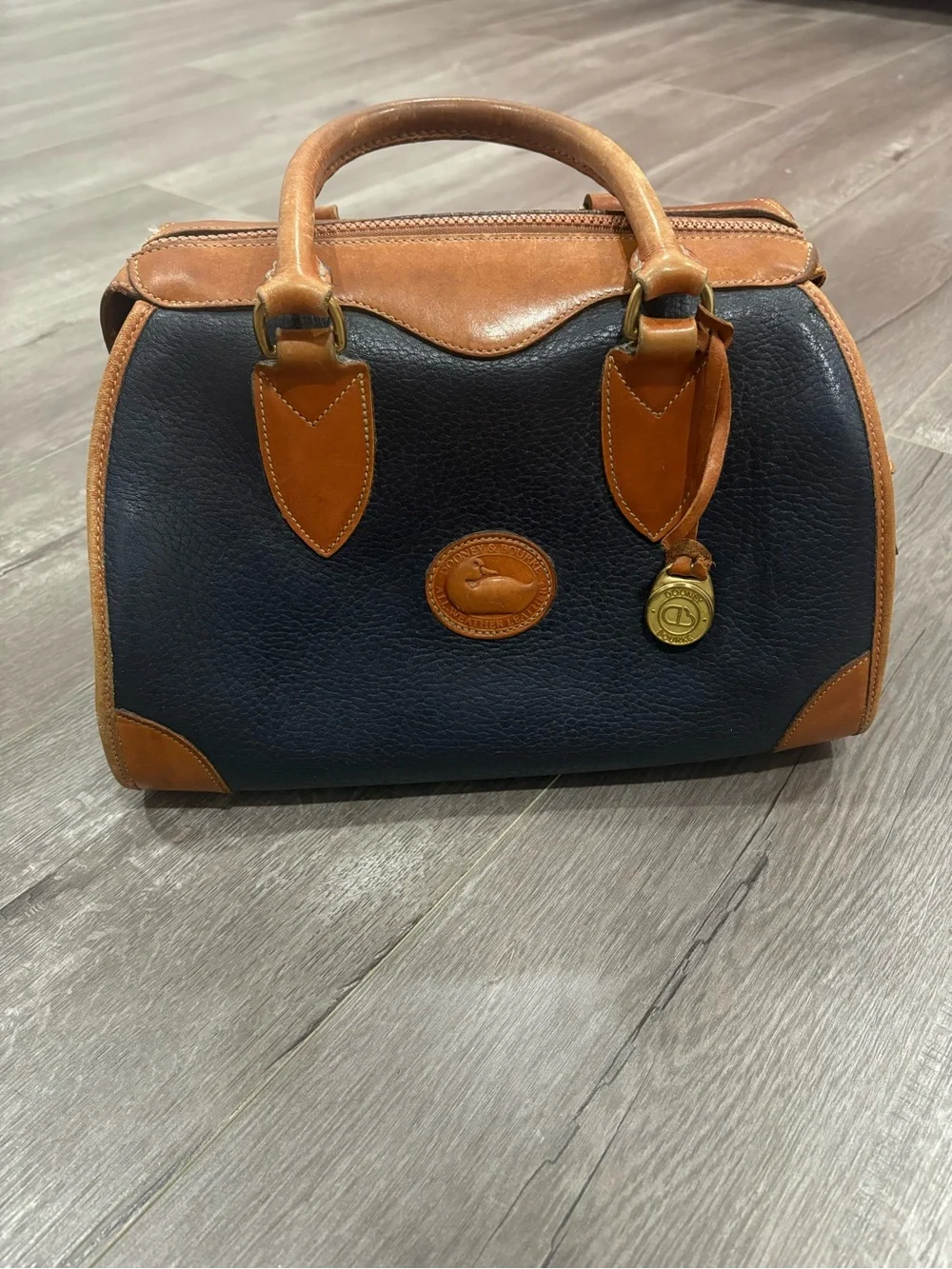 Dooney & Bourke Navy and Tan Pebbled Leather Doctor Bag